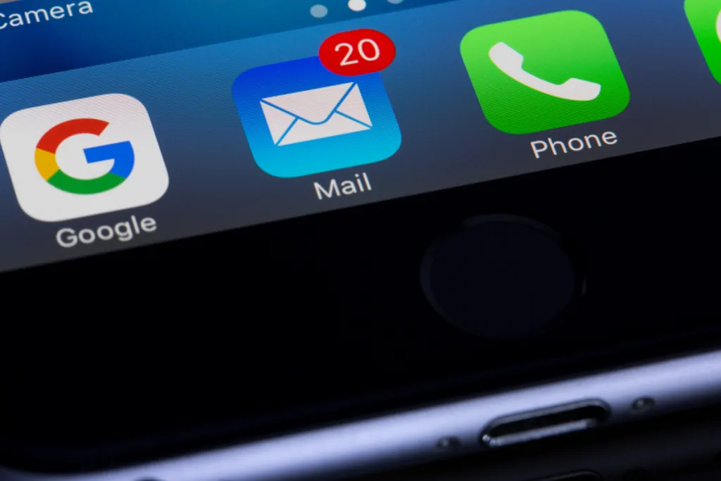 Smartphone home screen showing the Mail app with 20 unread messages