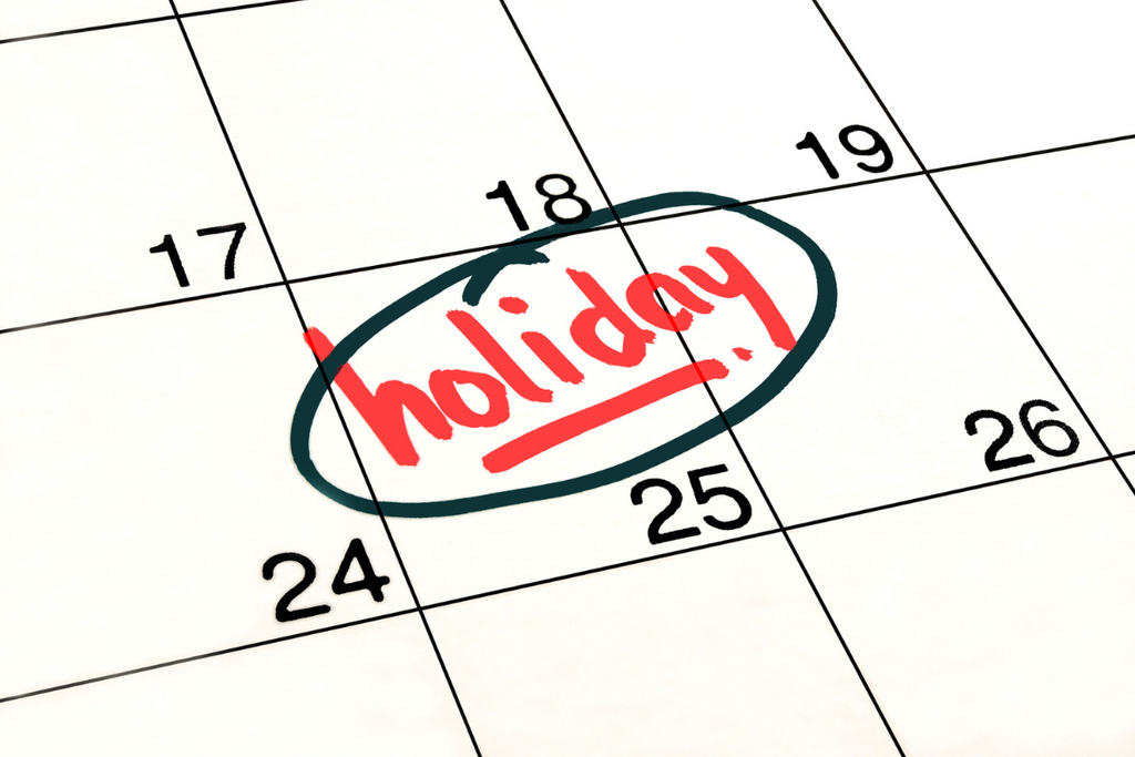 Calendar with a holiday date circled in red marker